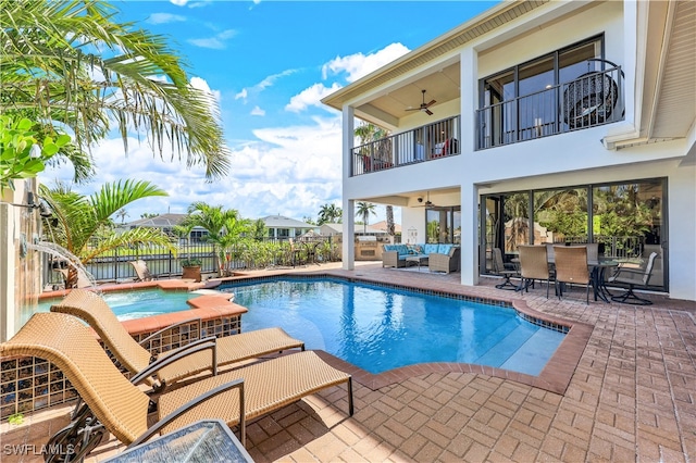 view of pool featuring an outdoor hangout area, an in ground hot tub, and ceiling fan