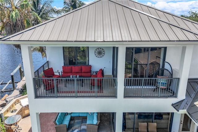 back of house featuring an outdoor hangout area