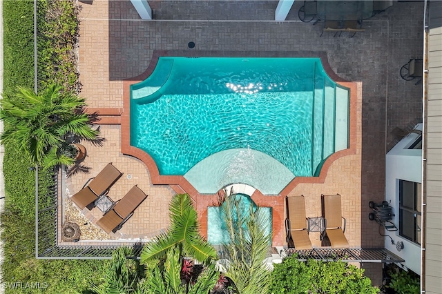 view of pool featuring a patio area