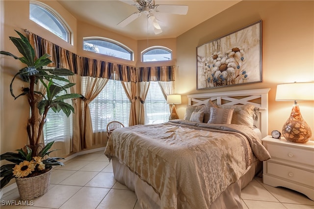 bedroom featuring ceiling fan and light tile patterned floors