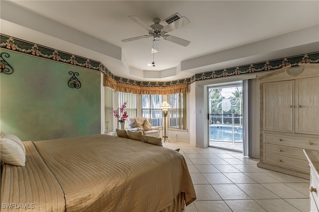 tiled bedroom with access to exterior and ceiling fan