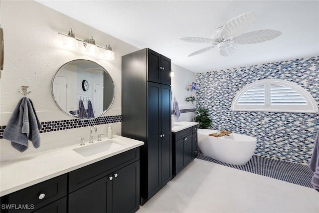 bathroom featuring tasteful backsplash, a tub, tile walls, ceiling fan, and vanity