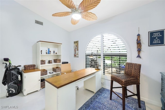 office featuring ceiling fan, lofted ceiling, and light colored carpet