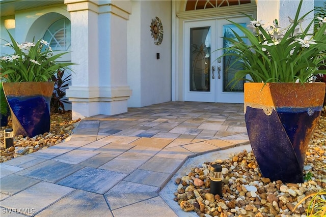 property entrance featuring french doors