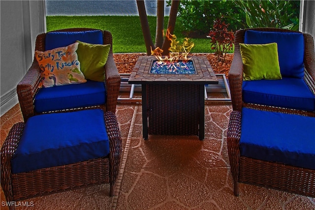 view of patio / terrace with a fire pit