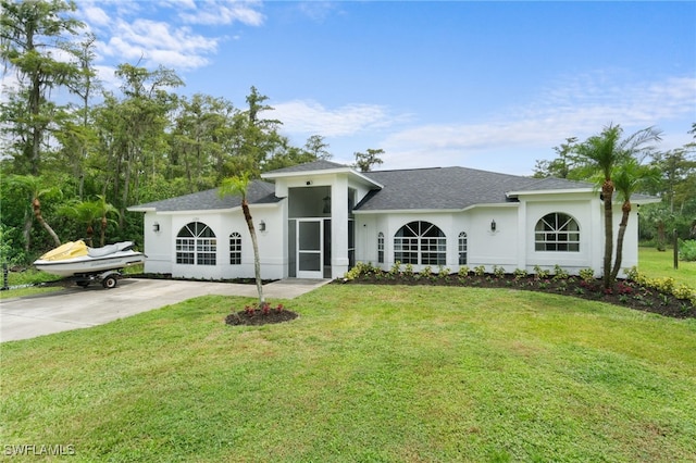 ranch-style house with a front yard