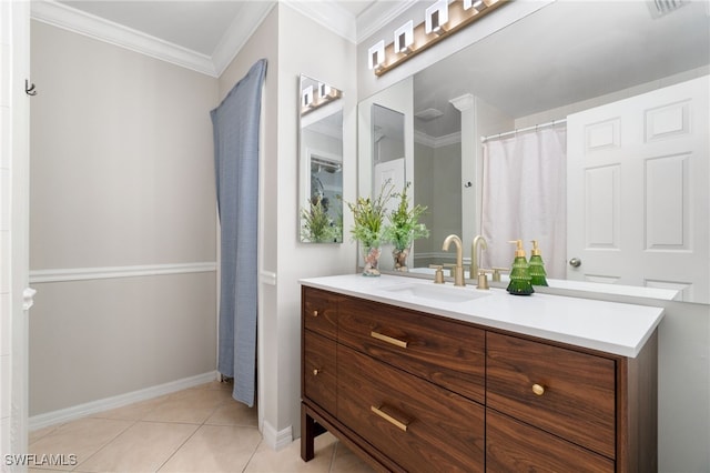 bathroom with ornamental molding, tile patterned flooring, and vanity