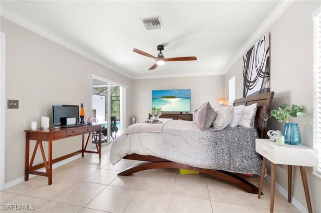 tiled bedroom featuring ornamental molding and ceiling fan