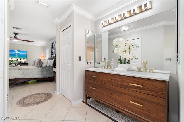 bathroom with tile patterned floors, ceiling fan, vanity, and crown molding