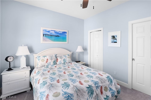 carpeted bedroom featuring ceiling fan and a closet