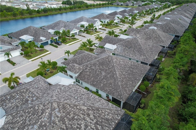 bird's eye view with a water view