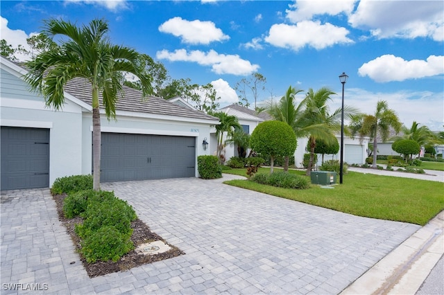 view of front of property with a garage