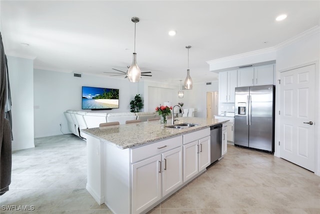 kitchen featuring ceiling fan, an island with sink, light tile patterned floors, sink, and stainless steel appliances