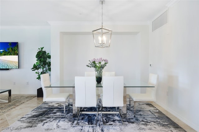 dining space featuring a notable chandelier, crown molding, and tile patterned floors