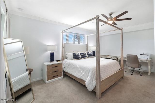 bedroom with ceiling fan, crown molding, and light carpet