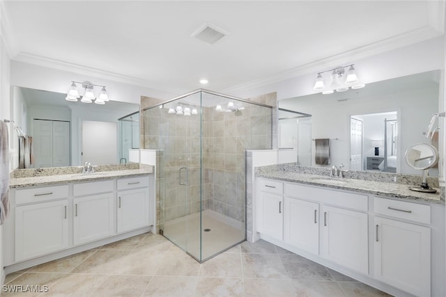 bathroom featuring tile patterned flooring, an enclosed shower, a chandelier, and ornamental molding