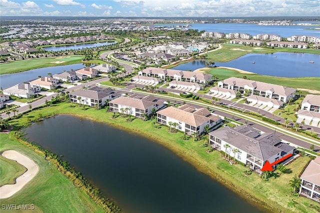 drone / aerial view with a water view