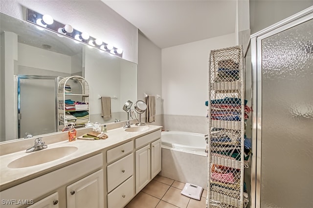 bathroom with vanity, tile patterned floors, and independent shower and bath