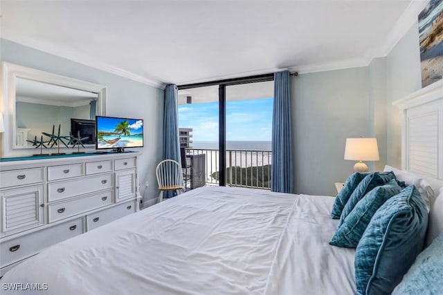 bedroom with crown molding and access to outside