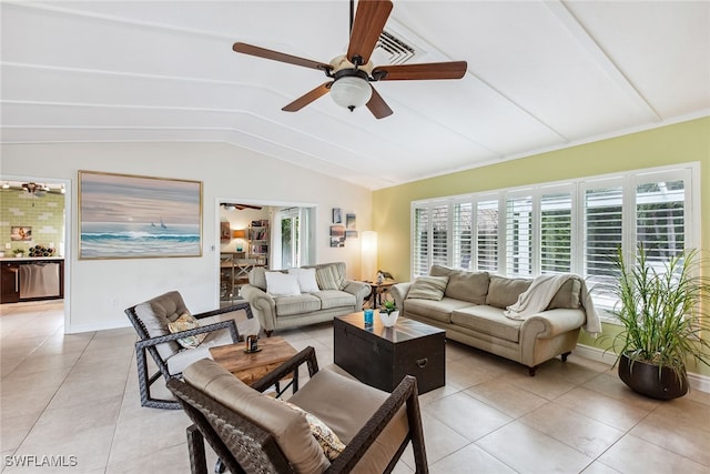 tiled living room featuring vaulted ceiling and ceiling fan