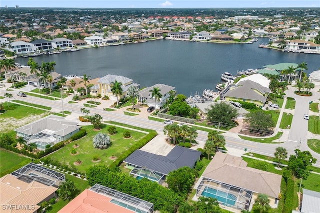 bird's eye view with a water view