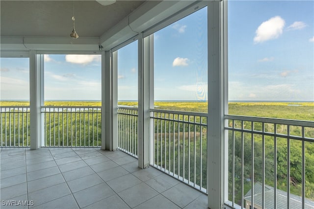 unfurnished sunroom featuring plenty of natural light