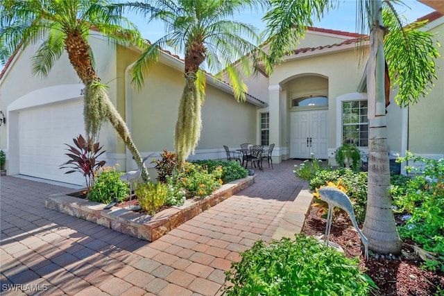 entrance to property with a garage