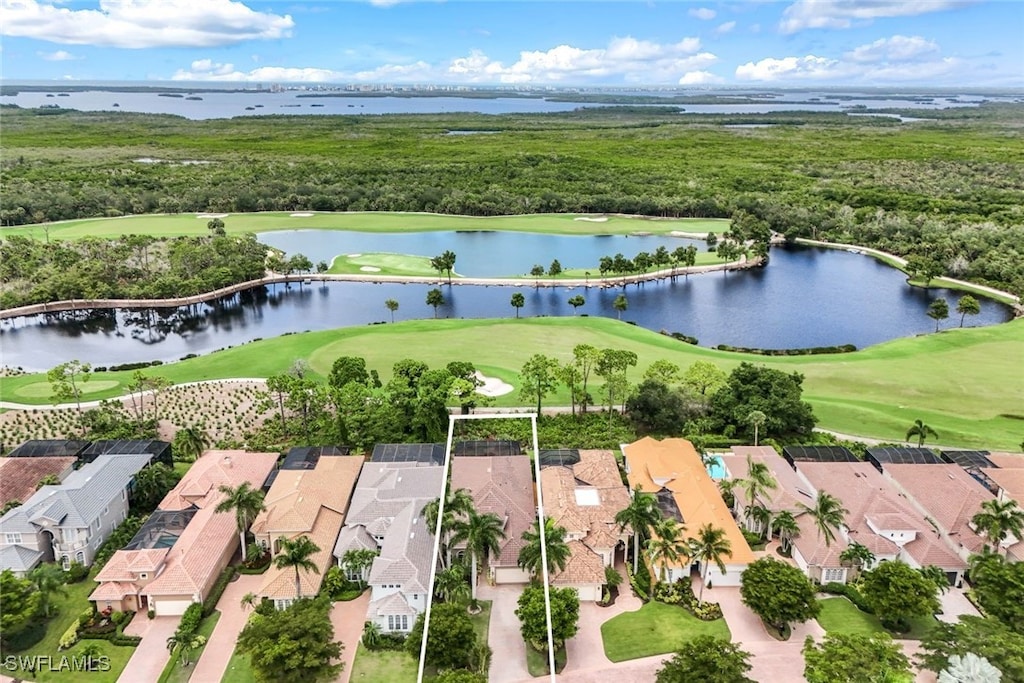 birds eye view of property featuring a water view