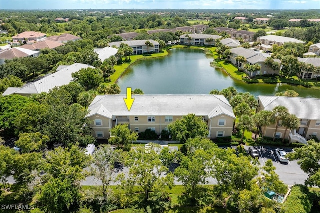 bird's eye view with a water view