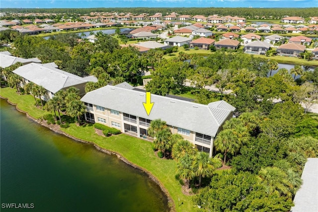 drone / aerial view featuring a water view