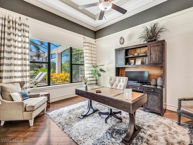 office area with baseboards, ceiling fan, ornamental molding, and wood finished floors