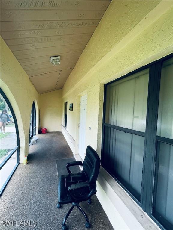 2807 E 8th St, Lehigh Acres, FL 33972 - view of patio / terrace featuring a balcony