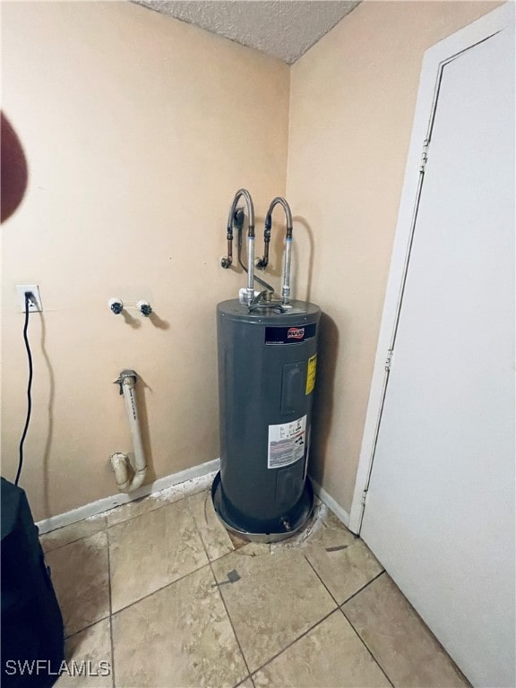 utility room featuring water heater