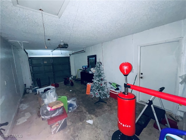 garage featuring a garage door opener