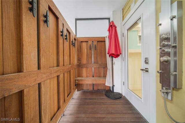 hallway featuring dark hardwood / wood-style flooring