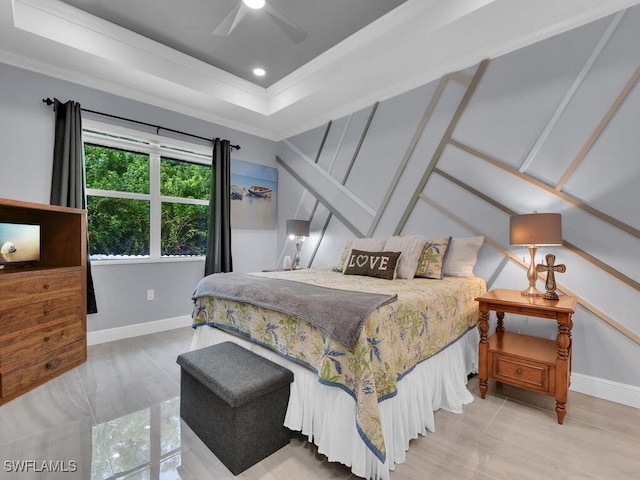 bedroom with ceiling fan, crown molding, a raised ceiling, and baseboards