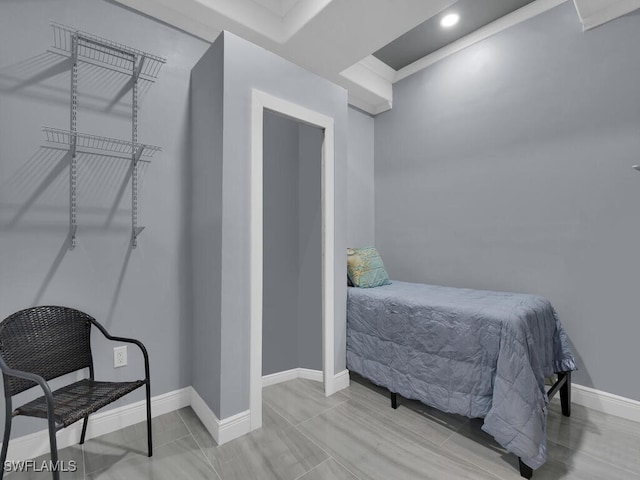 bedroom with baseboards and recessed lighting