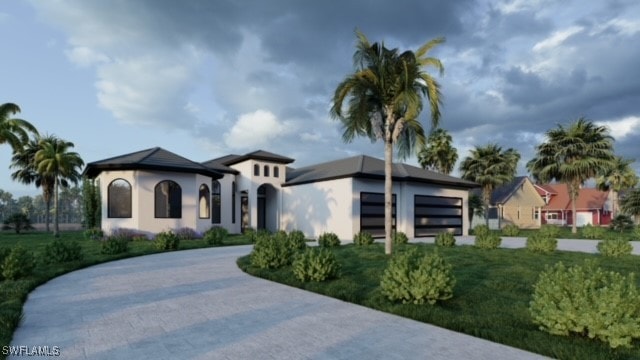 view of front of house with a garage