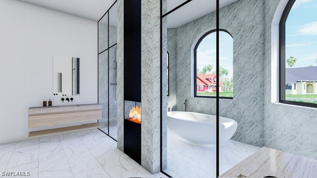 bathroom with tile patterned floors, independent shower and bath, and tile walls