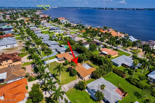 aerial view featuring a residential view and a water view