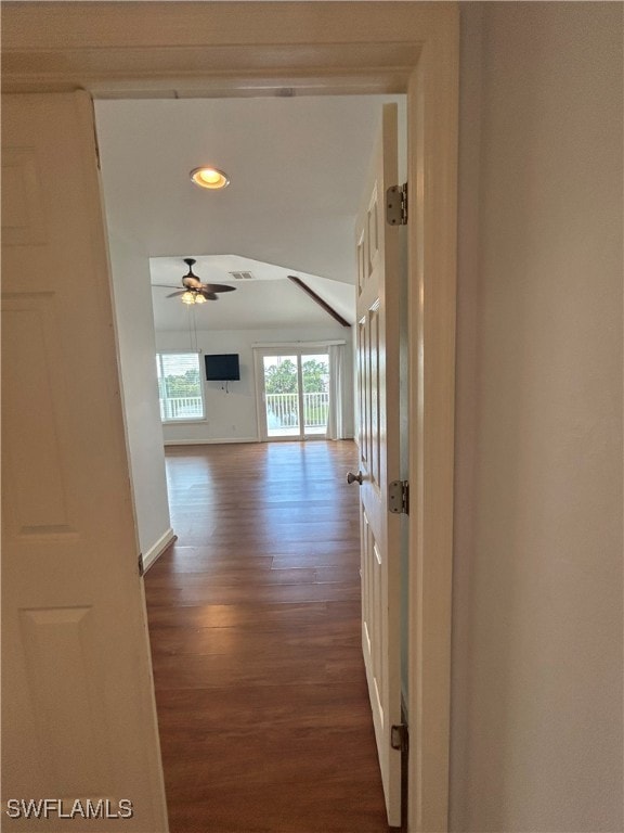 hallway with wood-type flooring