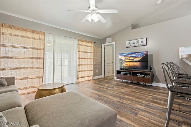 living room with hardwood / wood-style floors, vaulted ceiling, and ceiling fan