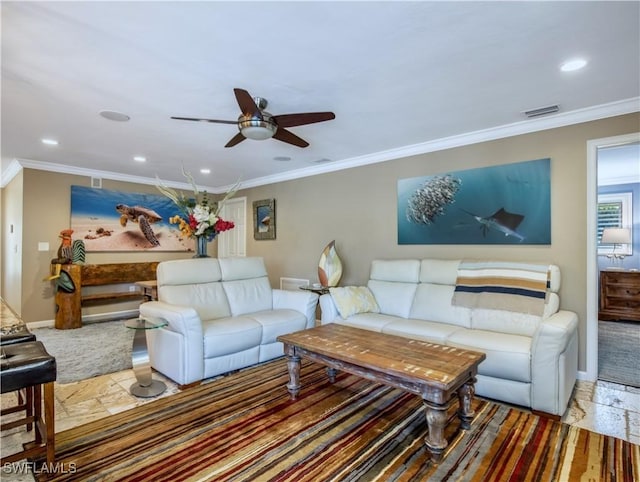 living room featuring crown molding and ceiling fan