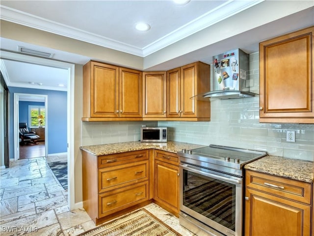 kitchen with wall chimney exhaust hood, tasteful backsplash, crown molding, light stone counters, and stainless steel appliances