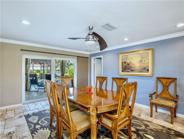 dining area featuring crown molding and ceiling fan