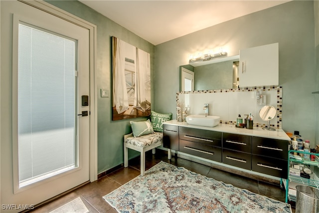 bathroom with tile patterned floors and vanity