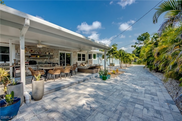 view of patio / terrace featuring ceiling fan and an outdoor hangout area