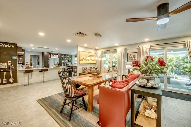 dining space with ceiling fan