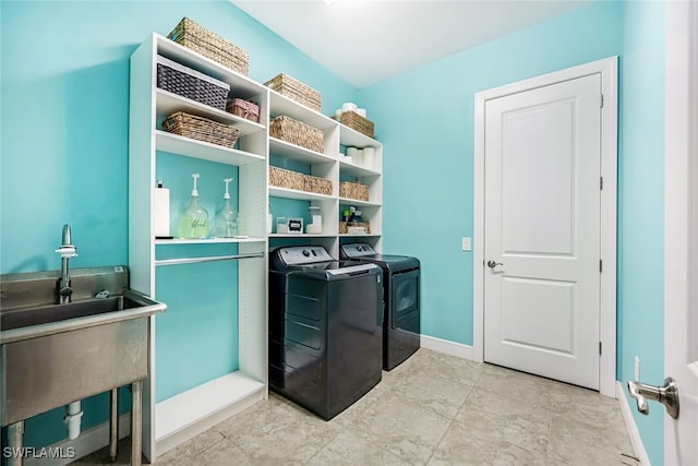 laundry room featuring washing machine and clothes dryer