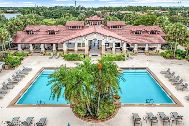 view of swimming pool with a patio area